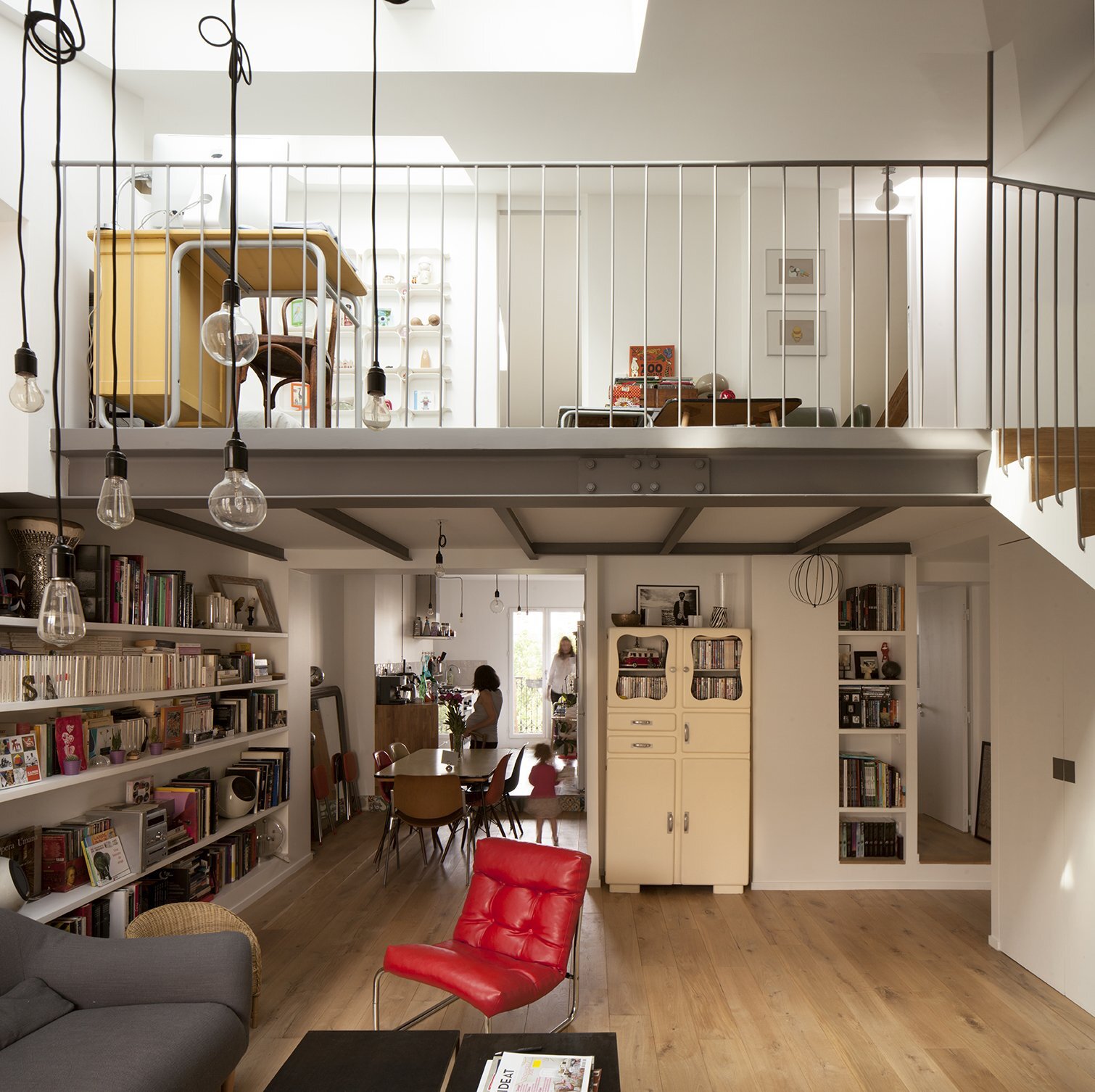 Parisian apartment opens attic to introduce more light