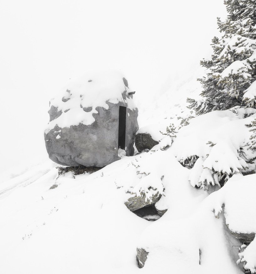 Stone-Shaped wooden cabin - bureau A - Swiss Alps - Exterior Snow - Humble Homes