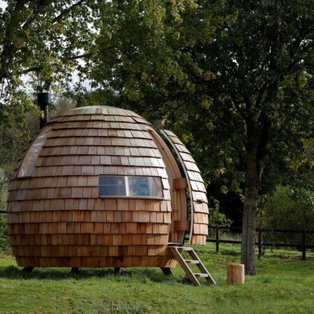 The Escape Pod is a Cedar-Clad Acorn-Shaped Retreat by Podmakers Ltd